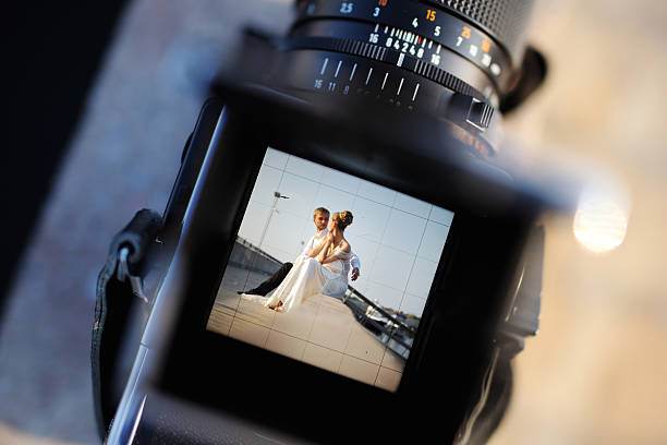 Picture of a wedding photo on a camera from a wedding vendor photographer.
