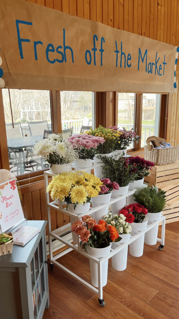 Fresh off the market bridal shower theme with a flower bar.