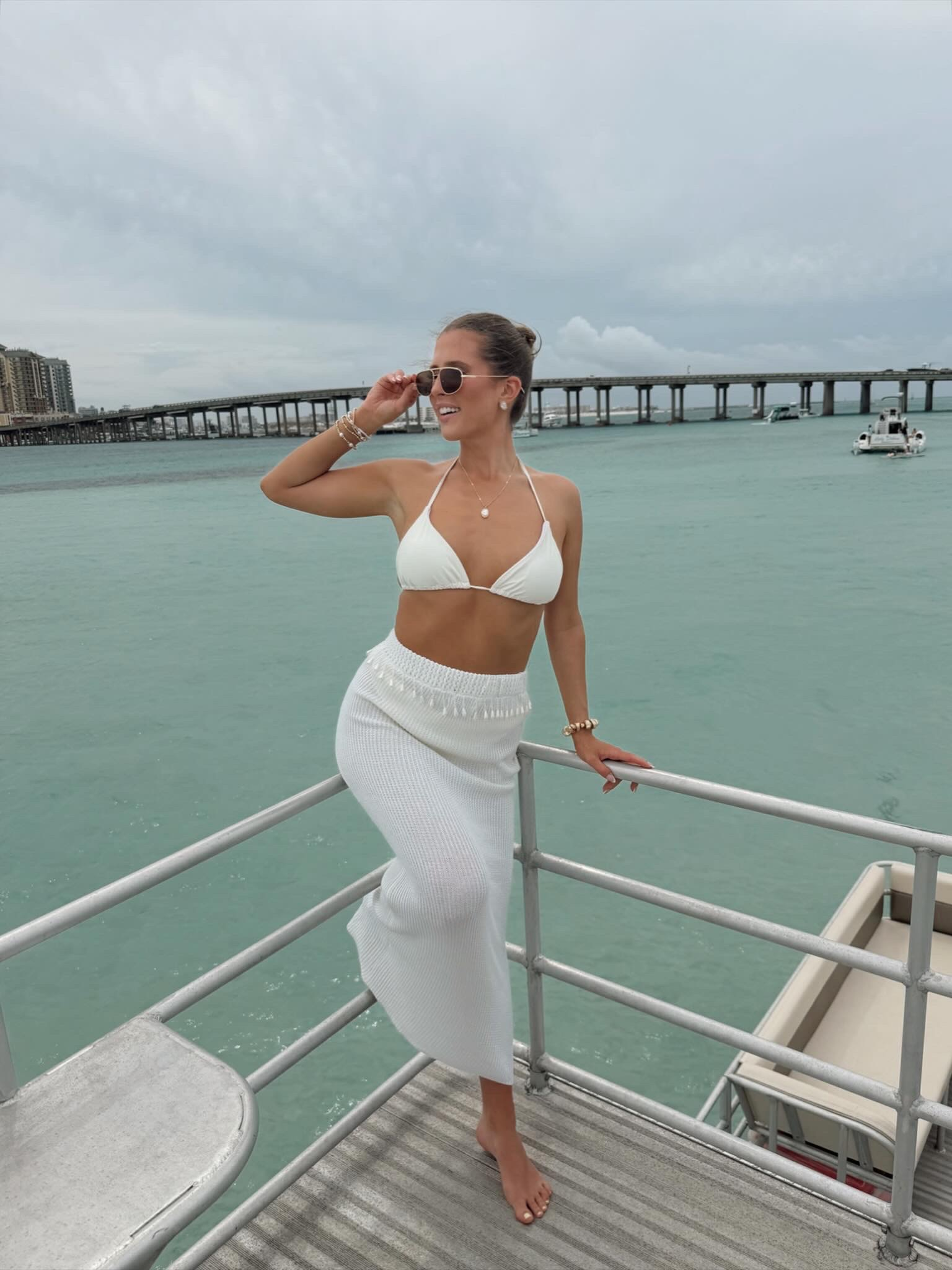 Bride on a boat at Crab Island in Destin, FL.