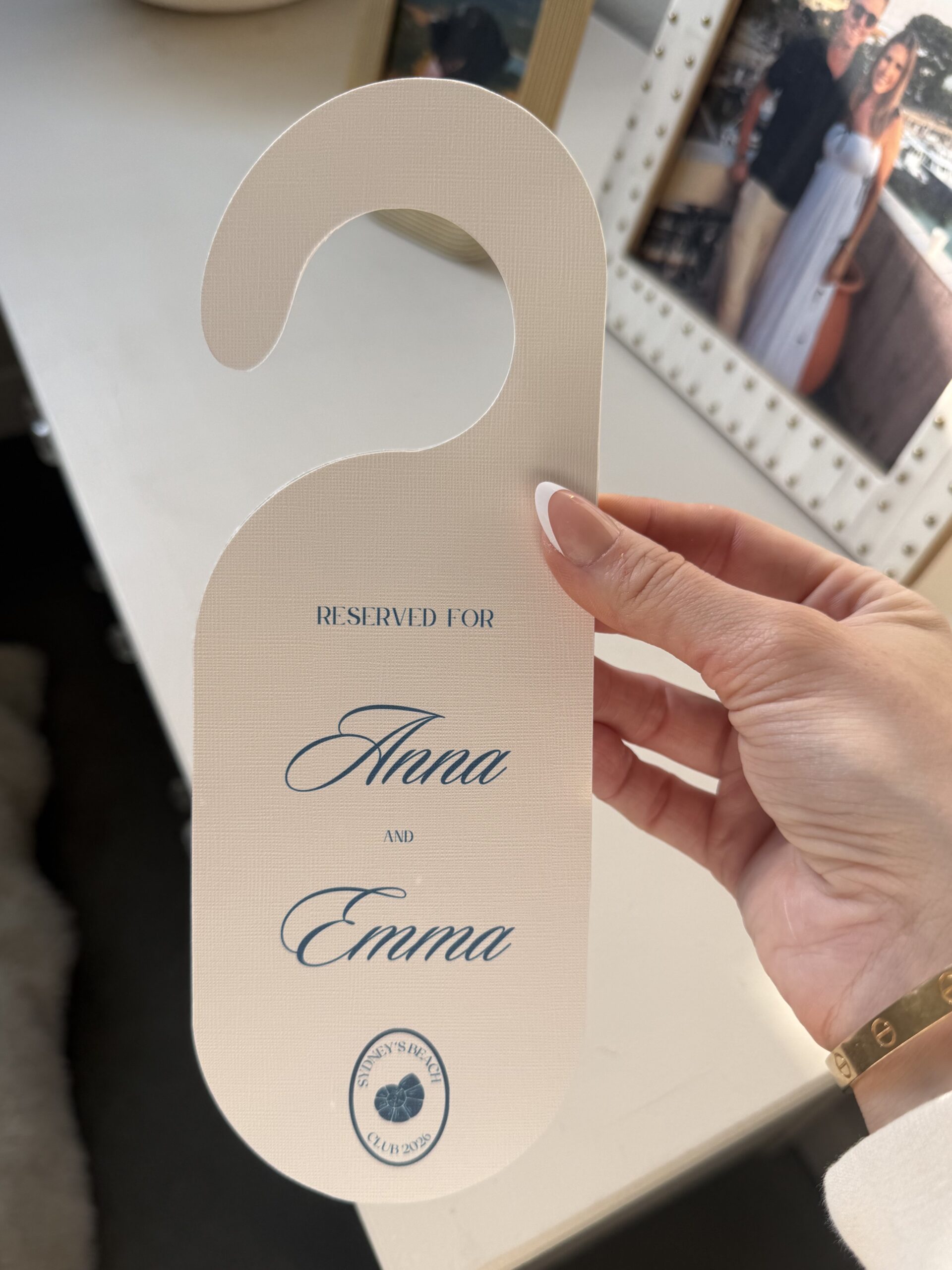 Custom door hanger sign for beach bachelorette decor.