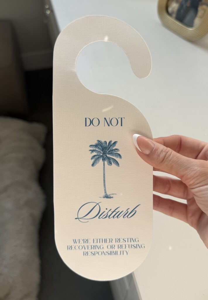 Custom door hanger sign for beach bachelorette decor.