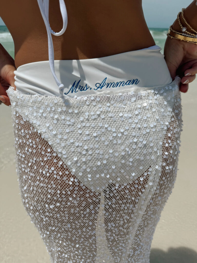 Embroidered white bikini bottoms with "Mrs." + last name.